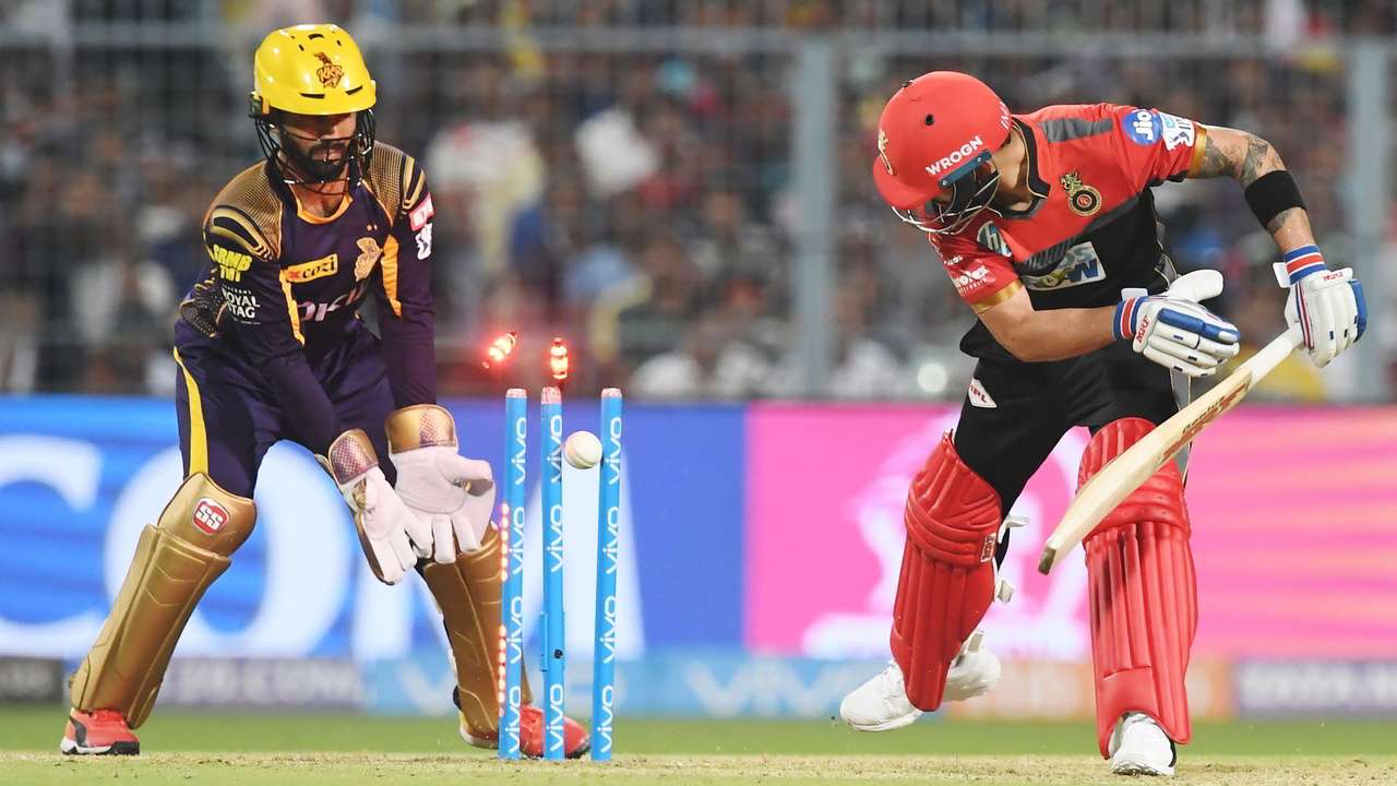 669945-dinesh-karthik-virat-kohli-afp